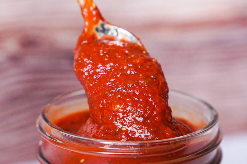 pizza sauce recipe on a spoon