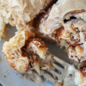 a forkful of the best sourdough cinnamon rolls