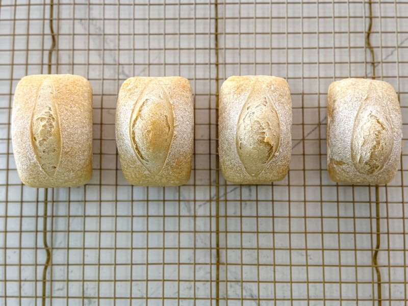 4 mini sourdough loaves with garlic