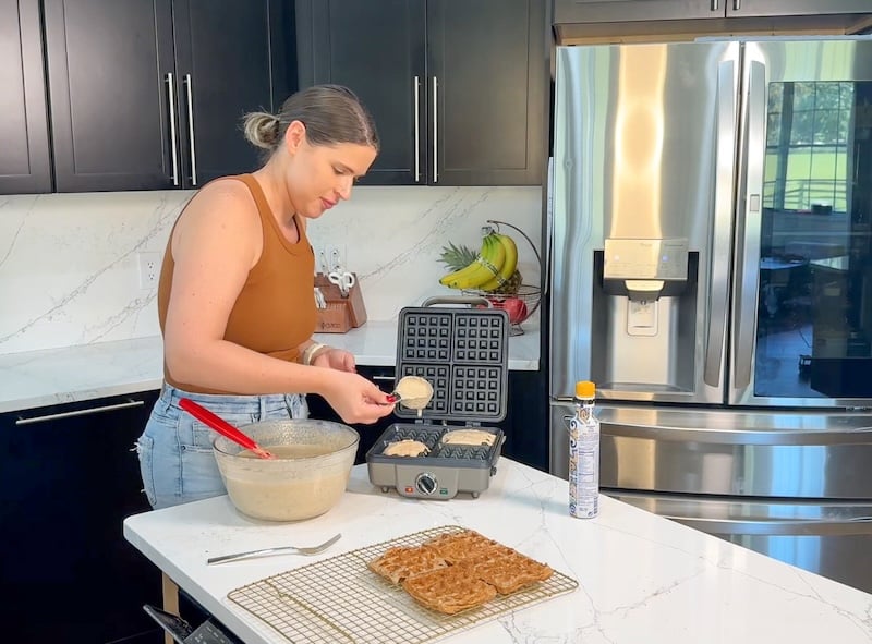 pouring batter into waffle maker