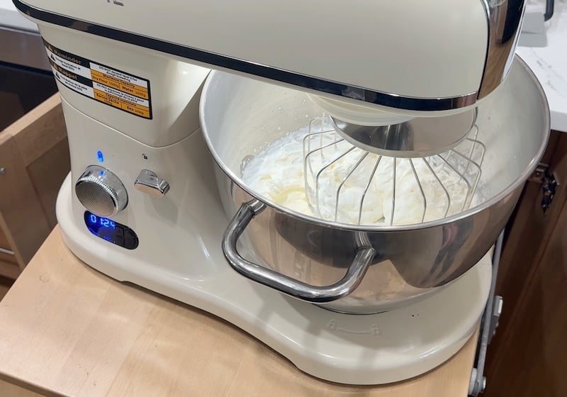 Zacme stand mixer with cream whipped to stiff peaks