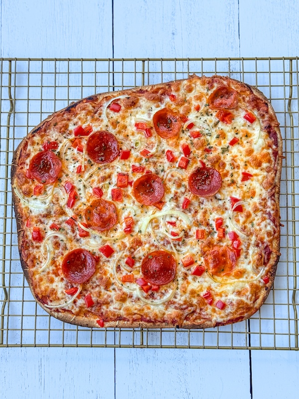 thin crust sourdough pizza with toppings
