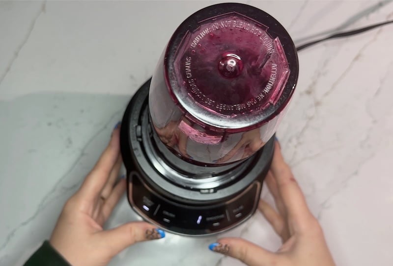 blending thawed wild blueberries into a smooth puree for the bagel dough