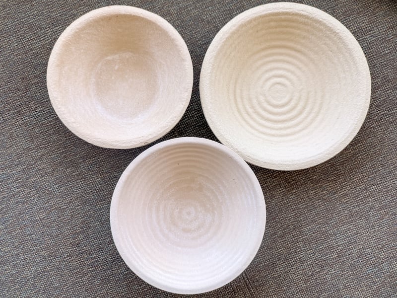 overhead view of three boule bannetons of different sizes for comparison