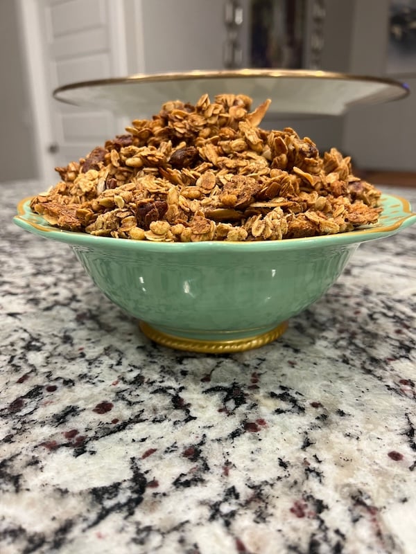 bowl of oats and honey sourdough discard granola