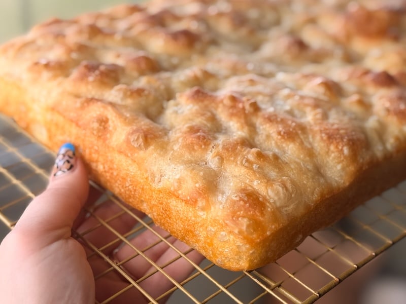 same day sourdough focaccia side angle of crispy crust