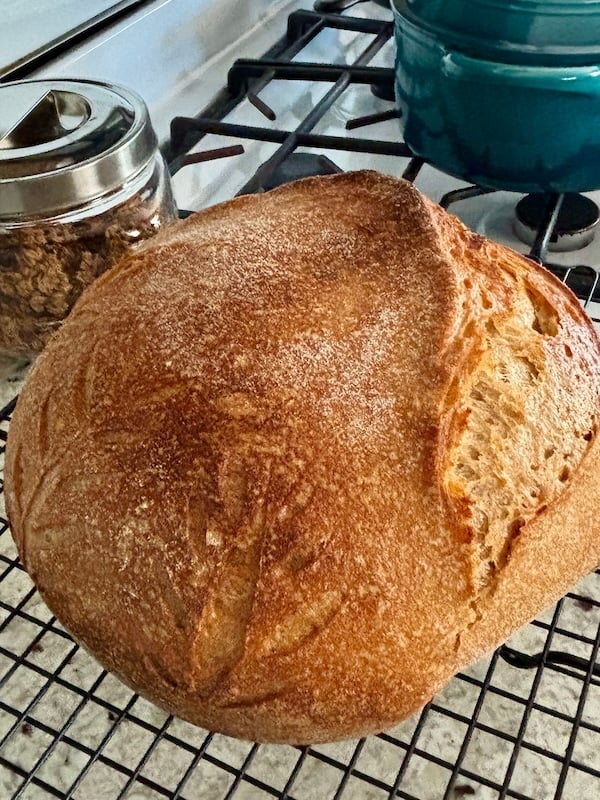 50% einkorn sourdough boule on a cooling rack
