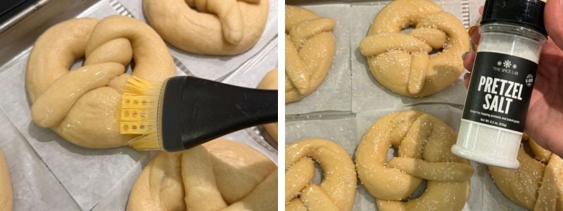 boiled pretzels being brushed with butter and sprinkled with pretzel salt before baking
