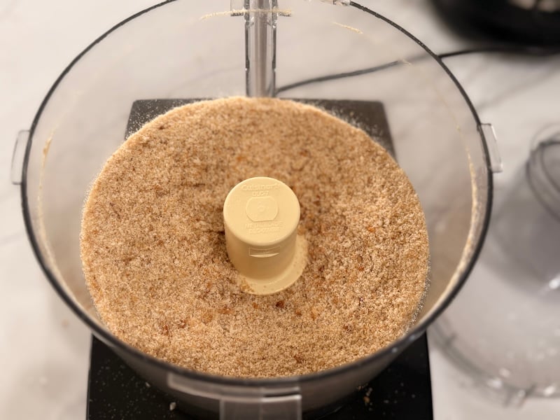 fine sourdough breadcrumbs in a food processor bowl ready for seasonings