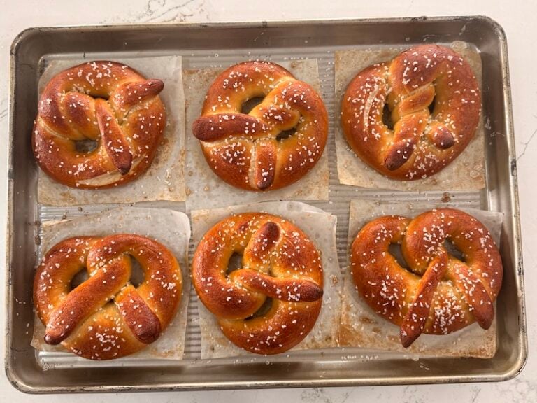 sourdough soft pretzels out of the oven looking deep mahogony brown