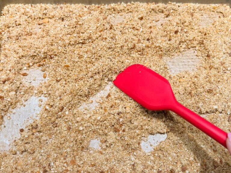 tossing breadcrumbs halfway through the bake