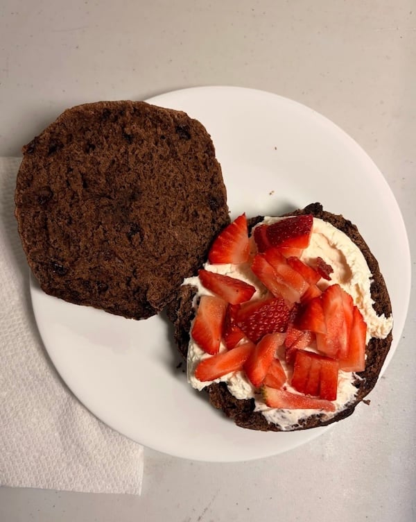 chocolate bagel with cream cheese and strawberries