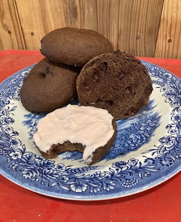 chocolate bagel with cream cheese topping