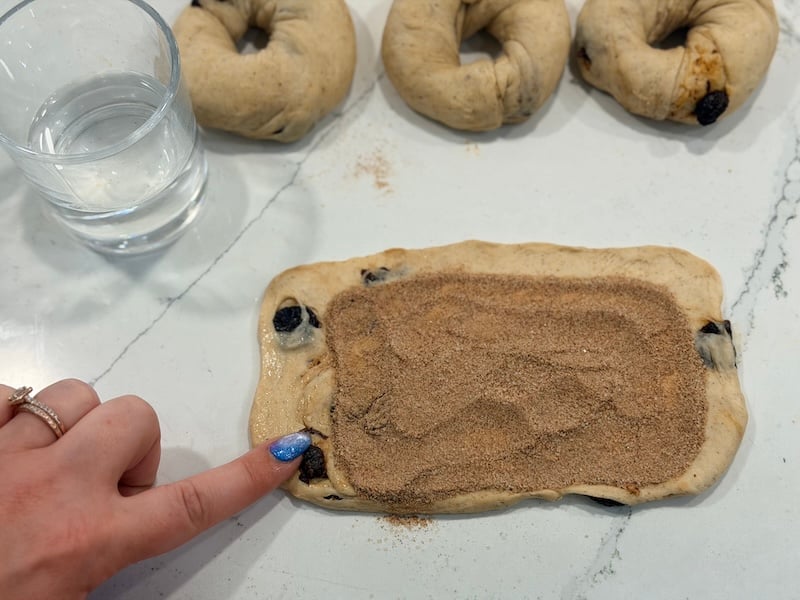 dab water on dough to help it adhere to itself