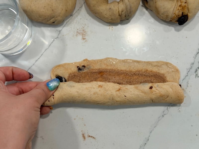 roll up log and pinch the seams closed