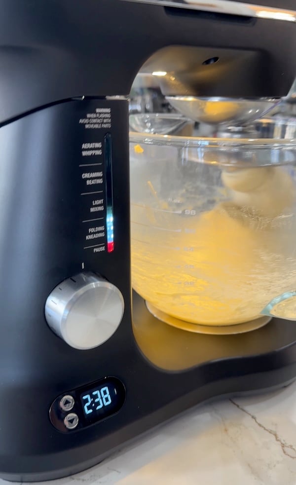 side view of breville mixer with dough hook and timer going