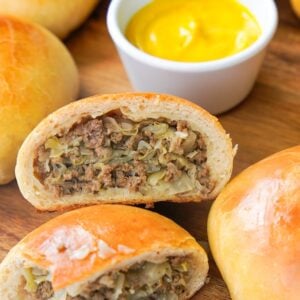 sourdough bierocks cut open to reveal the beef and cabbage filling