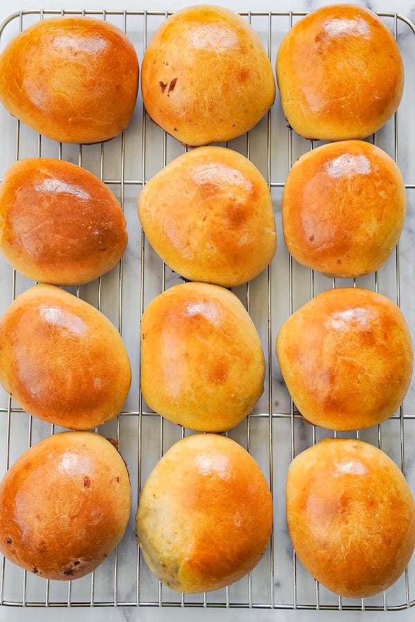 sourdough bierocks out of the oven and on a cooling rack