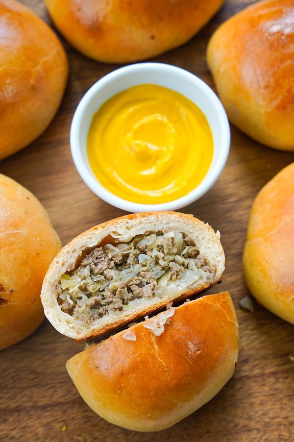 sourdough bierocks or runza on a platter with mustard