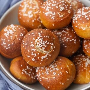 bowl of golden brown soft sourdough pretzel bites