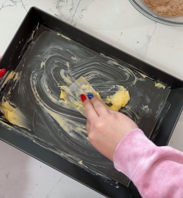 buttering lloyd pan for focaccia transfer