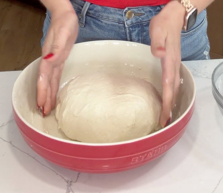 focaccia dough after the second round of coil folds, smoother and beginning to hold its shape