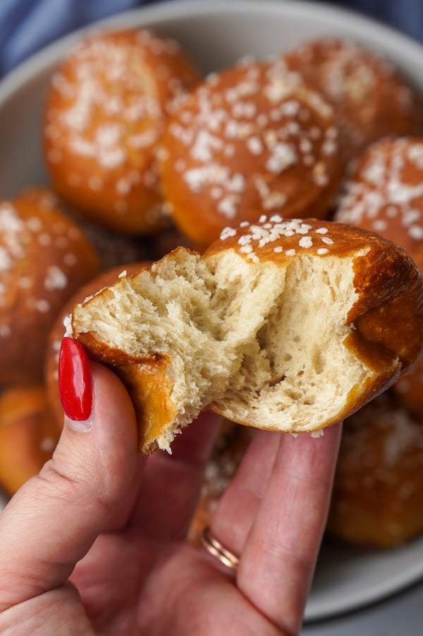 fluffy interior of a golden brown soft sourdough pretzel bite
