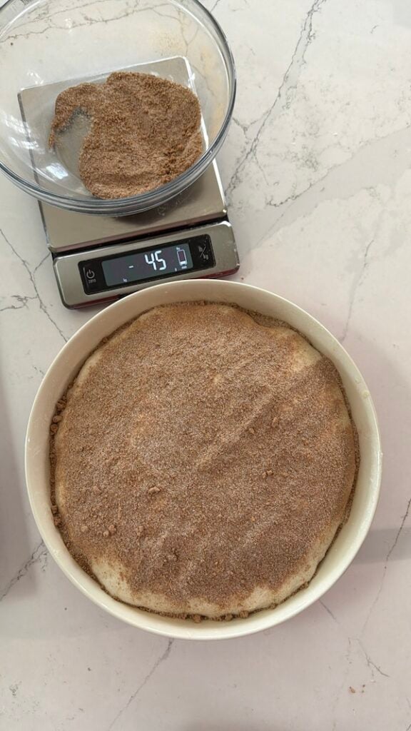 half of cinnamon sugar mixture on top of focaccia
