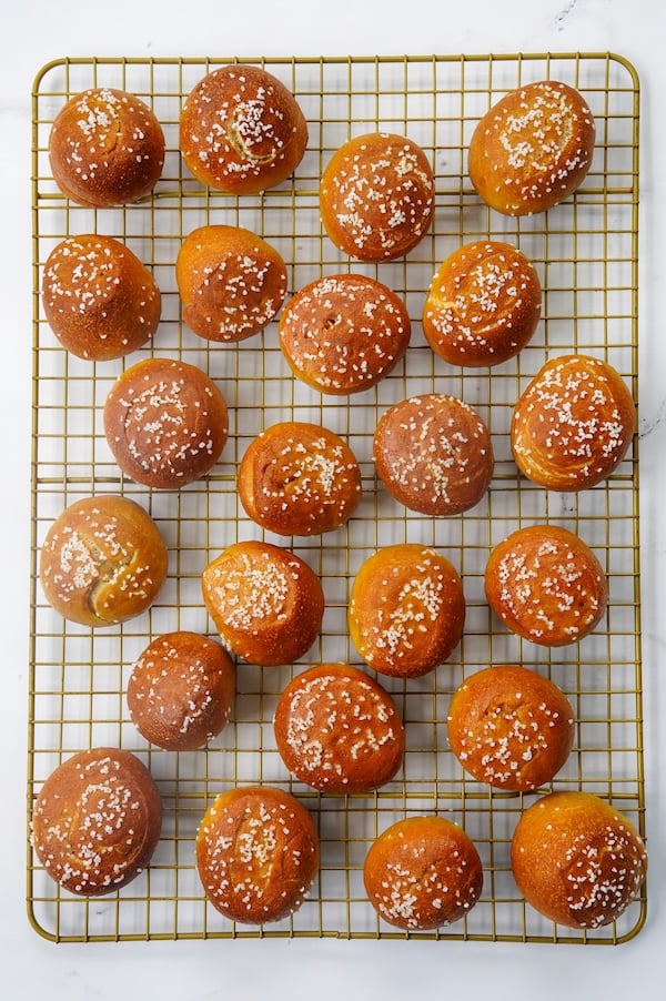soft sourdough pretzel bites on a cooling rack