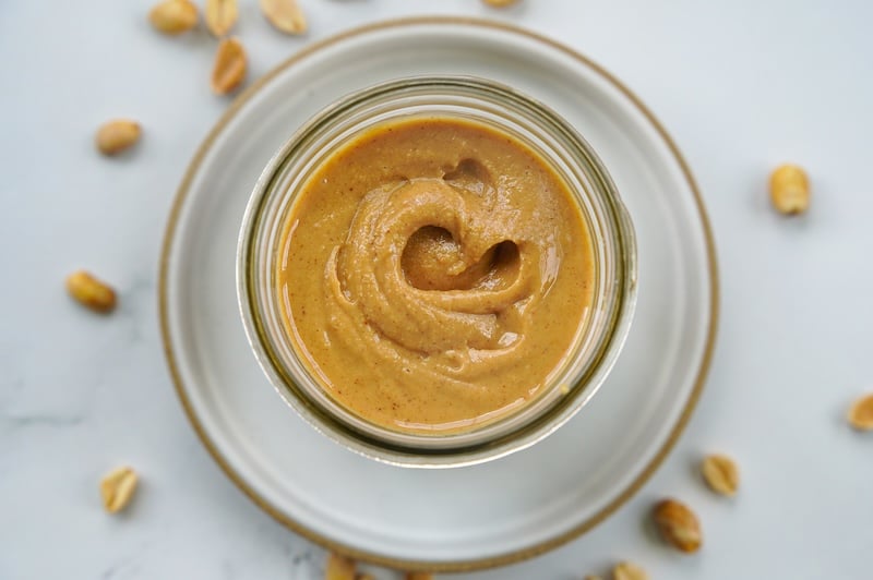 homemade peanut butter in a pint mason jar
