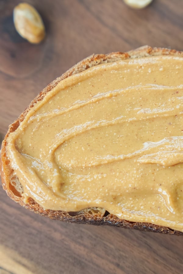 homemade peanut butter on a slice of sourdough bread