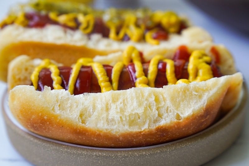 close look at soft pull apart texture of the hot dog bun sides