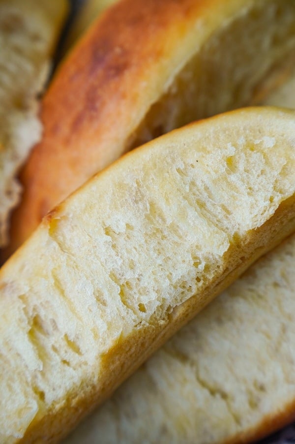 hot dog bun side where it was pulled apart from its neighbor bun