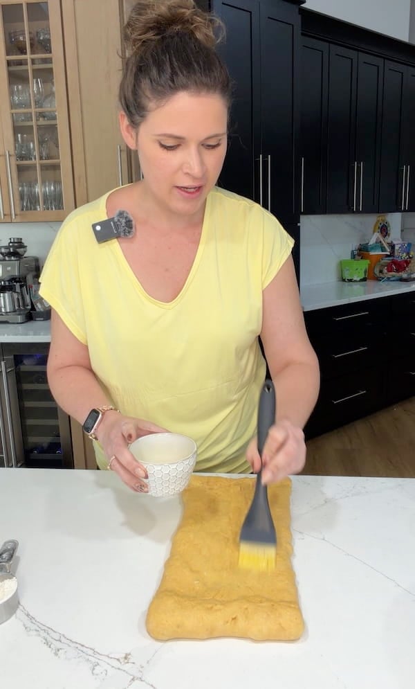 brush egg wash on second layer
