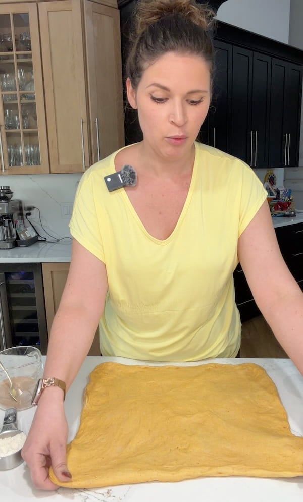 gently stretch the dough out